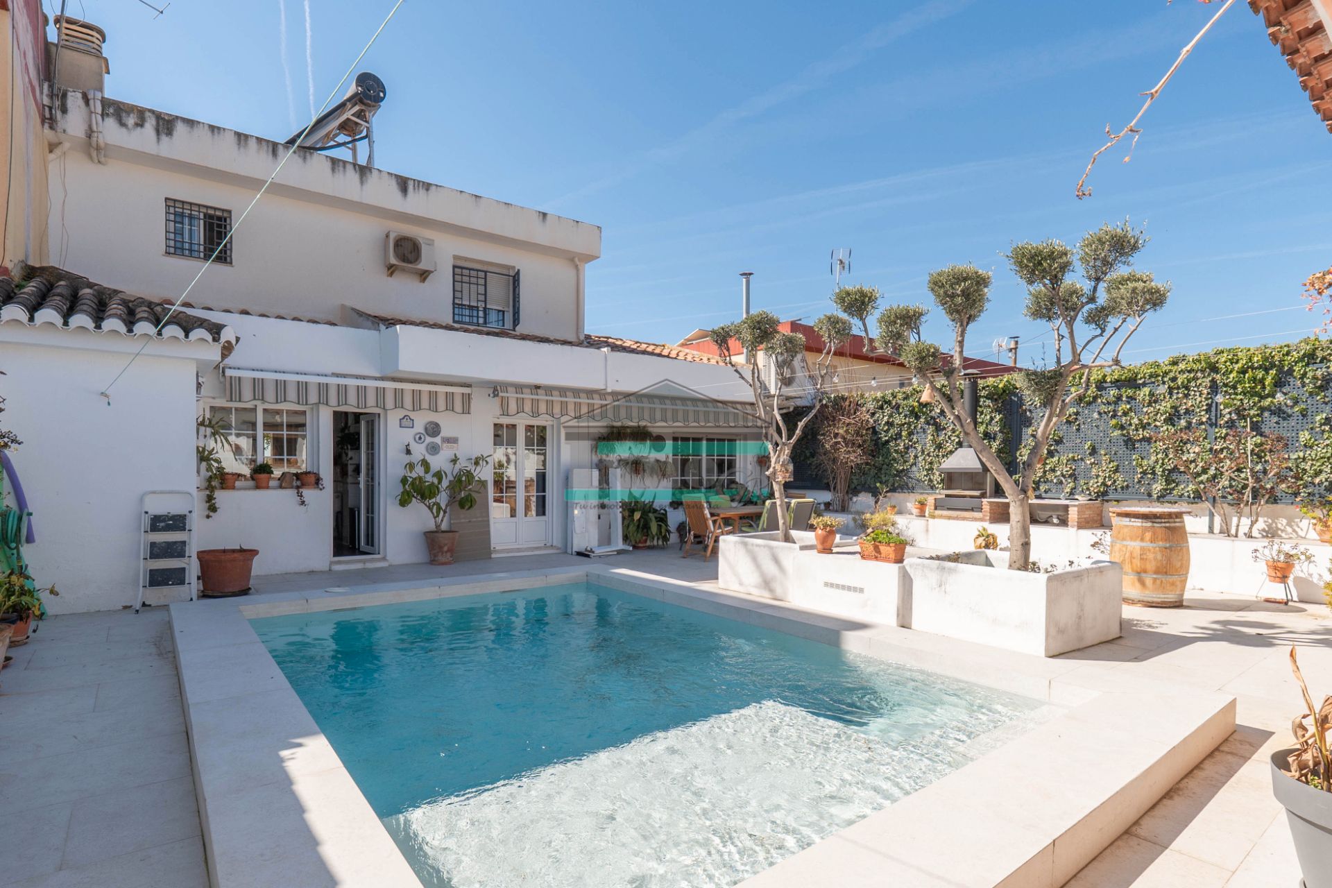 Piscina de Casa adosada en venta en Ogíjares con Aire acondicionado, Calefacción y Jardín privado