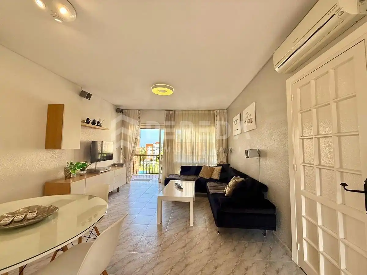 Sala de estar de Apartamento en venta en Roquetas de Mar con Aire acondicionado, Jardín privado y Amueblado