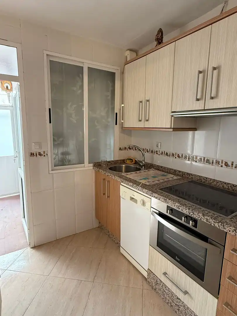 Küche von Einfamilien-Reihenhaus zum Verkauf in Mérida mit Klimaanlage und Abstellraum