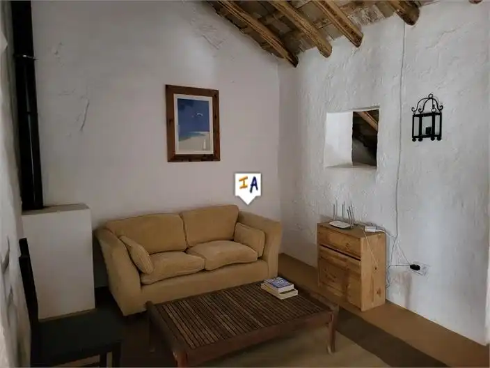 Sala d'estar de Casa adosada en venda en Lora de Estepa amb Piscina
