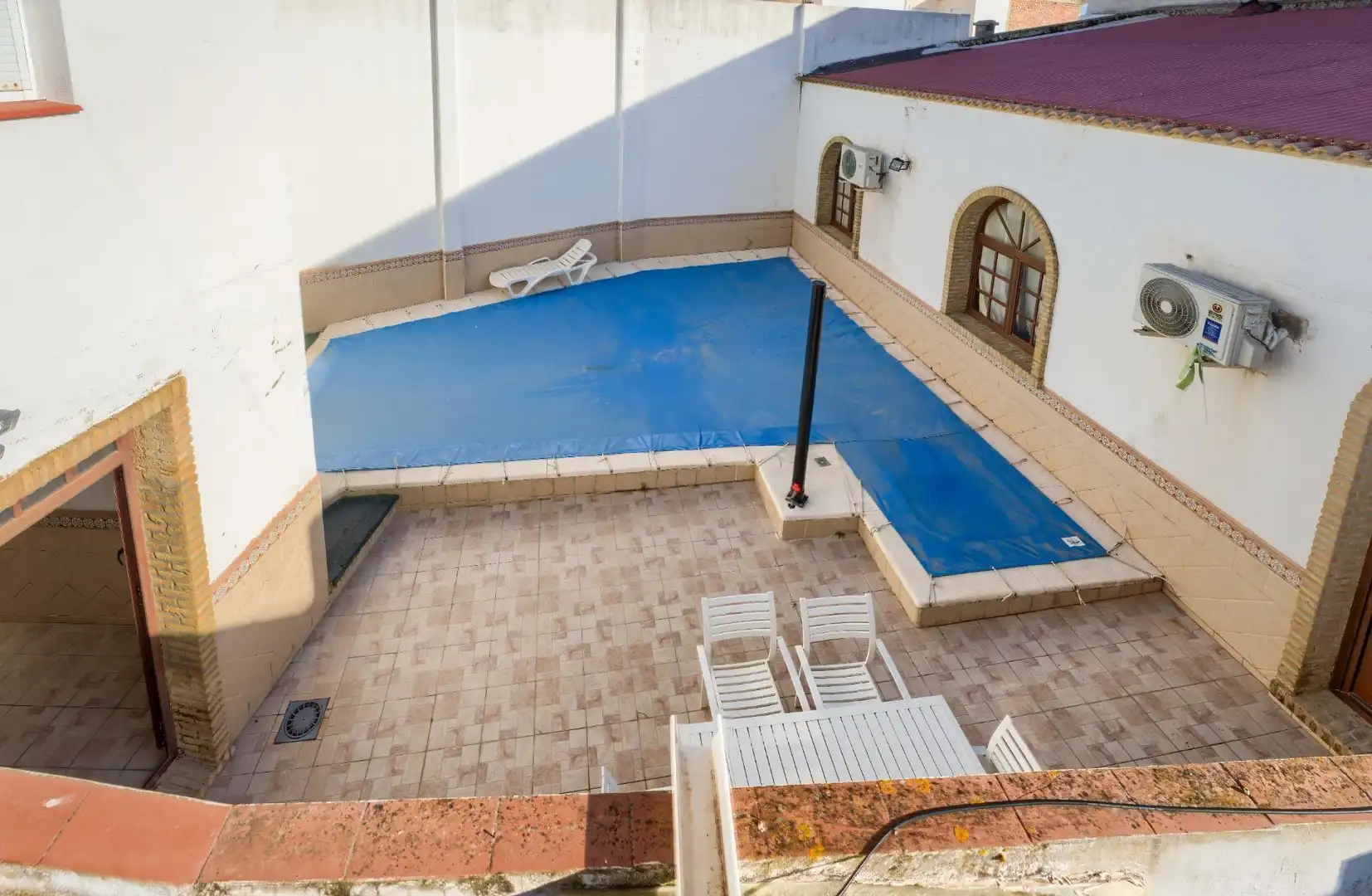 Piscina de Casa adosada en venta en La Palma del Condado con Aire acondicionado, Calefacción y Terraza