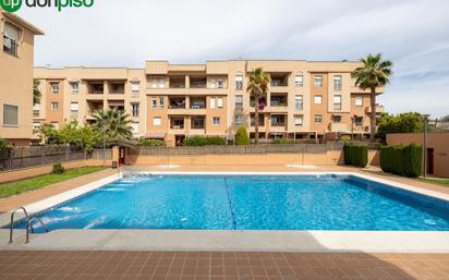 Swimming pool of Flat for sale in  Granada Capital  with Air Conditioner, Heating and Private garden