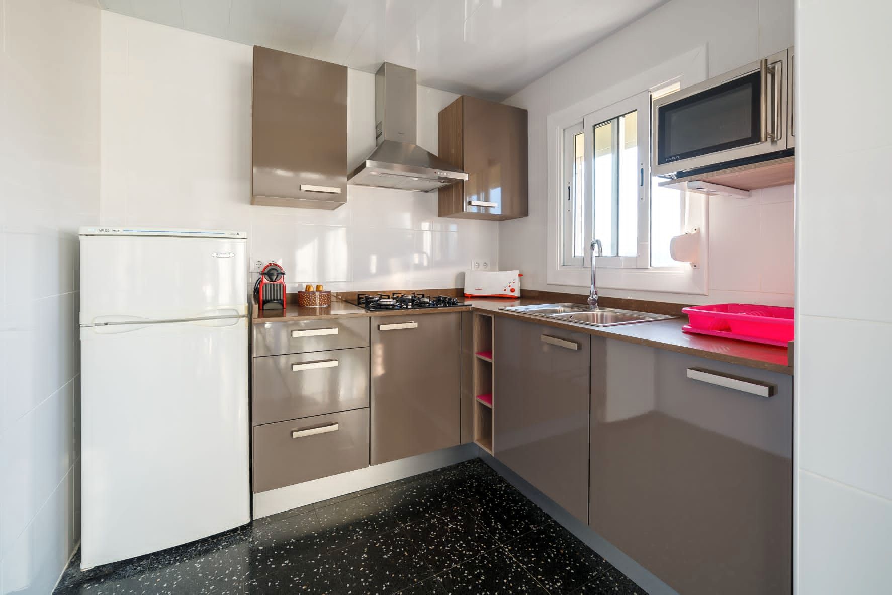 Cuina de Pis de lloguer en Sant Feliu de Guíxols amb Calefacció, Terrassa i Moblat