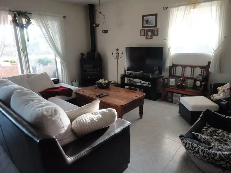 Sala de estar de Finca rústica en venta en La Nucia con Aire acondicionado, Jardín privado y Terraza