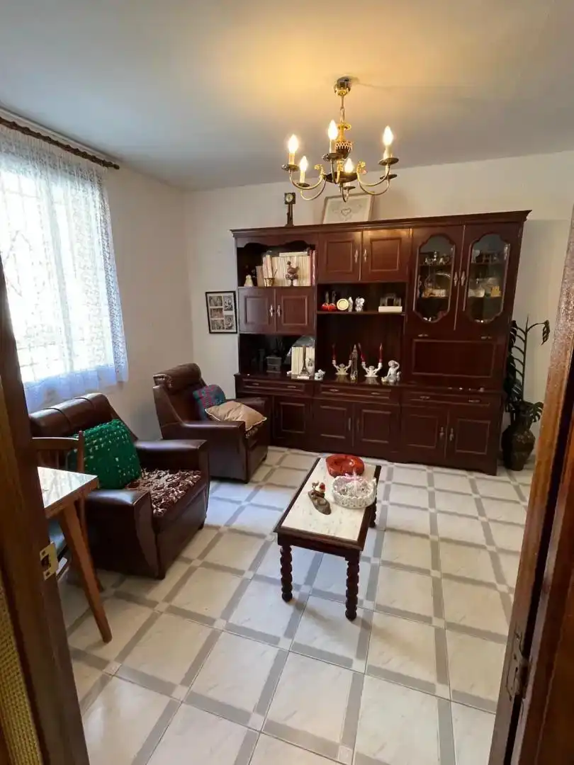 Sala d'estar de Casa adosada en venda en Alagón amb Terrassa i Balcó