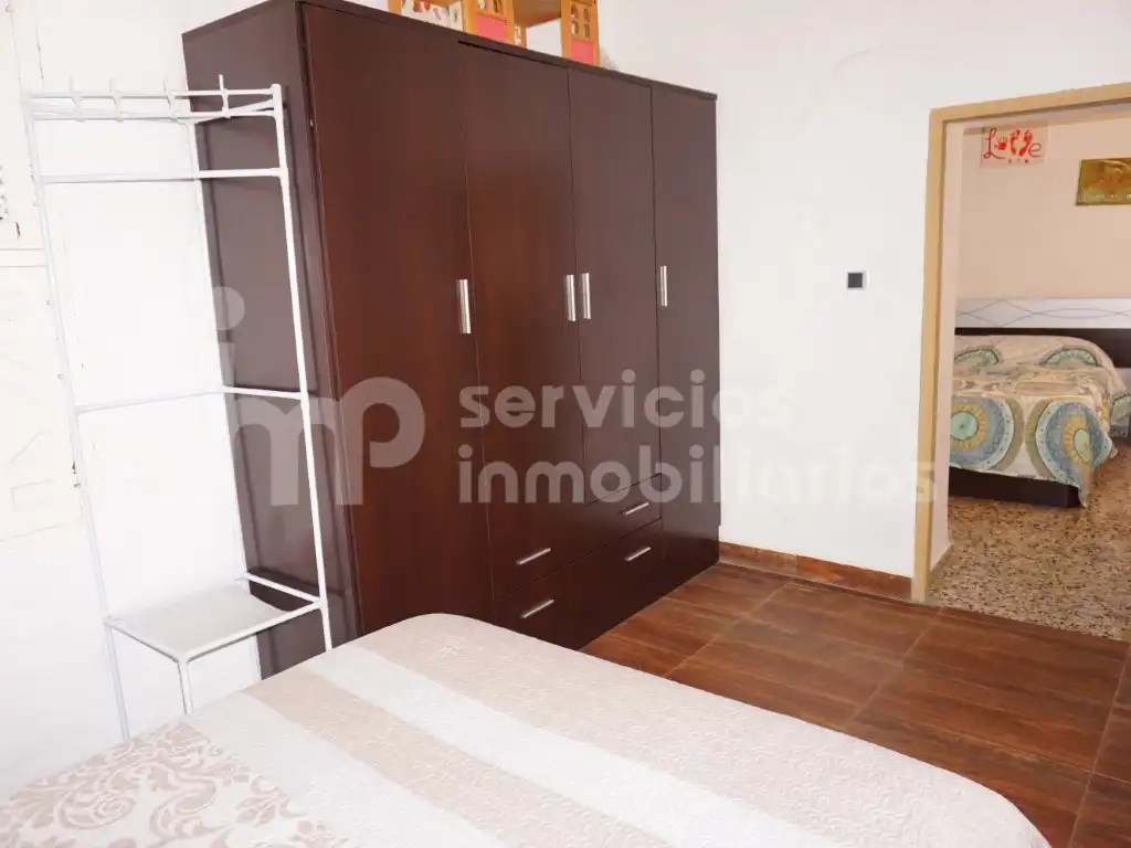 Habitación de Casa adosada en venta en Benamocarra con Jardín privado, Terraza y Amueblado