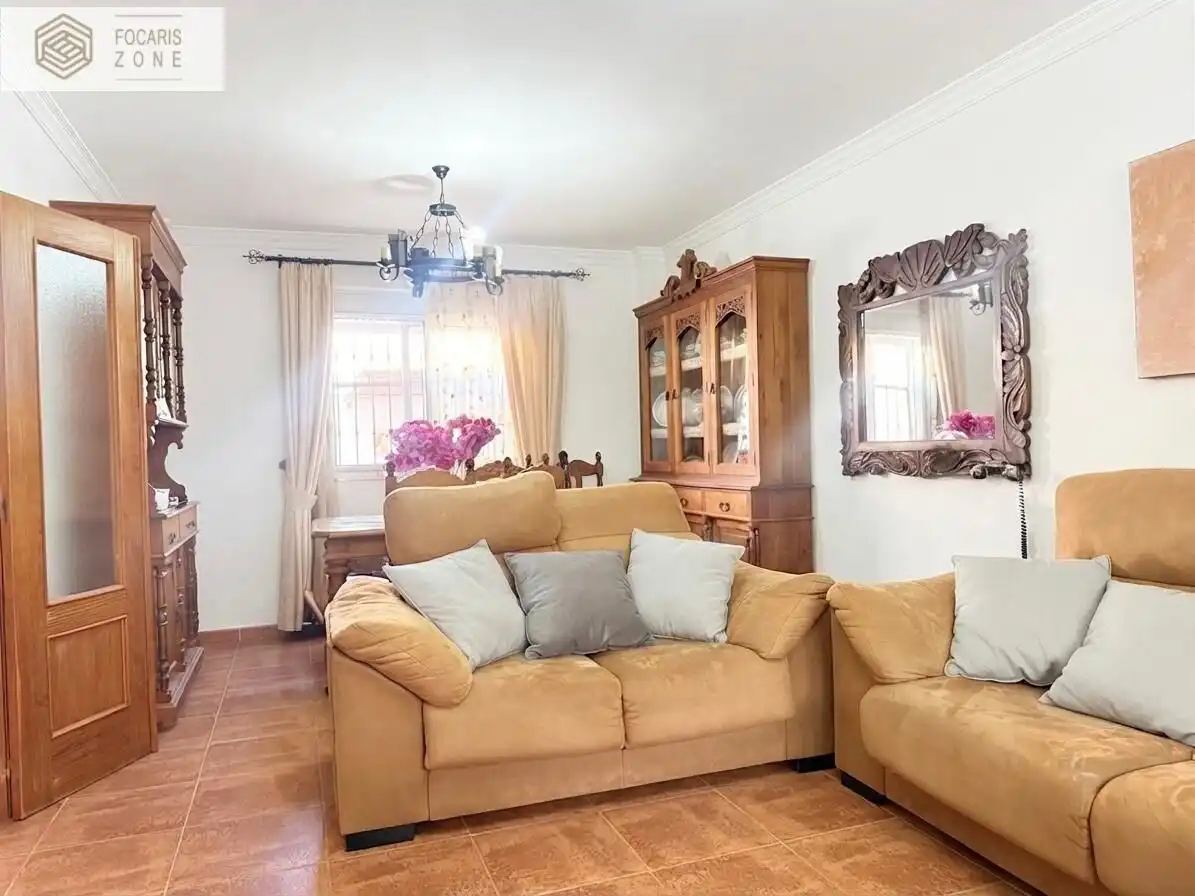 Sala d'estar de Casa adosada en venda en Málaga amb Aire condicionat, Calefacció i Terrassa