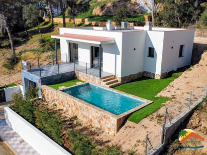 Swimming pool of House or chalet for sale in Lloret de Mar  with Air Conditioner, Heating and Private garden