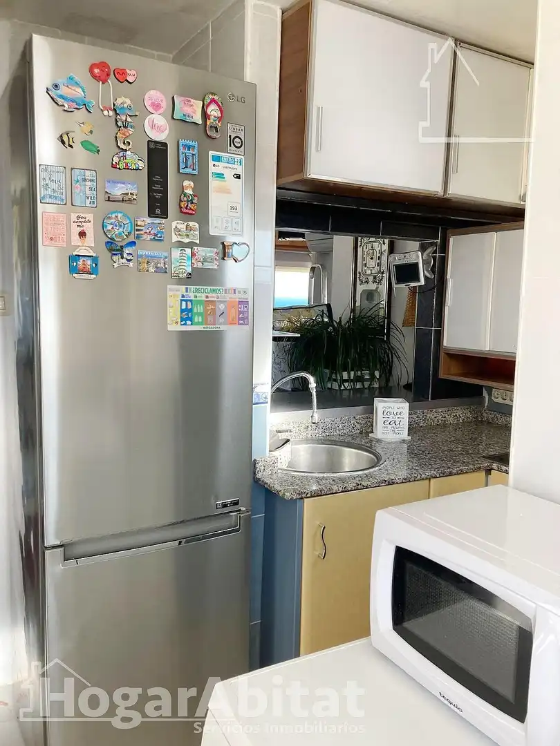 Kitchen of Flat for sale in Gandia  with Air Conditioner, Private garden and Community pool