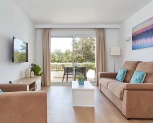 Sala d'estar de Apartament en venda en Sant Josep de sa Talaia amb Aire condicionat, Calefacció i Jardí privat