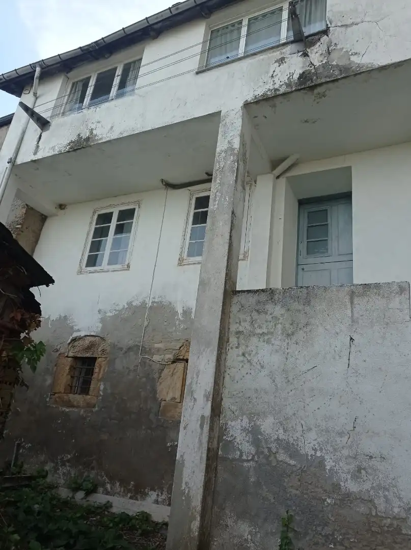 Vista exterior de Casa adosada en venda en A Fonsagrada  amb Jardí privat, Moblat i Balcó