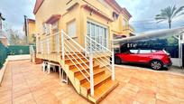 Exterior view of Single-family semi-detached for sale in Gandia  with Air Conditioner, Heating and Private garden