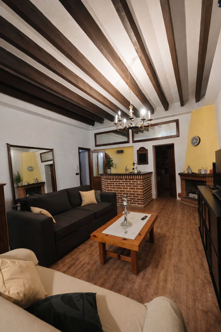 Sala d'estar de Casa o xalet en venda en Alicante / Alacant amb Aire condicionat, Calefacció i Jardí privat