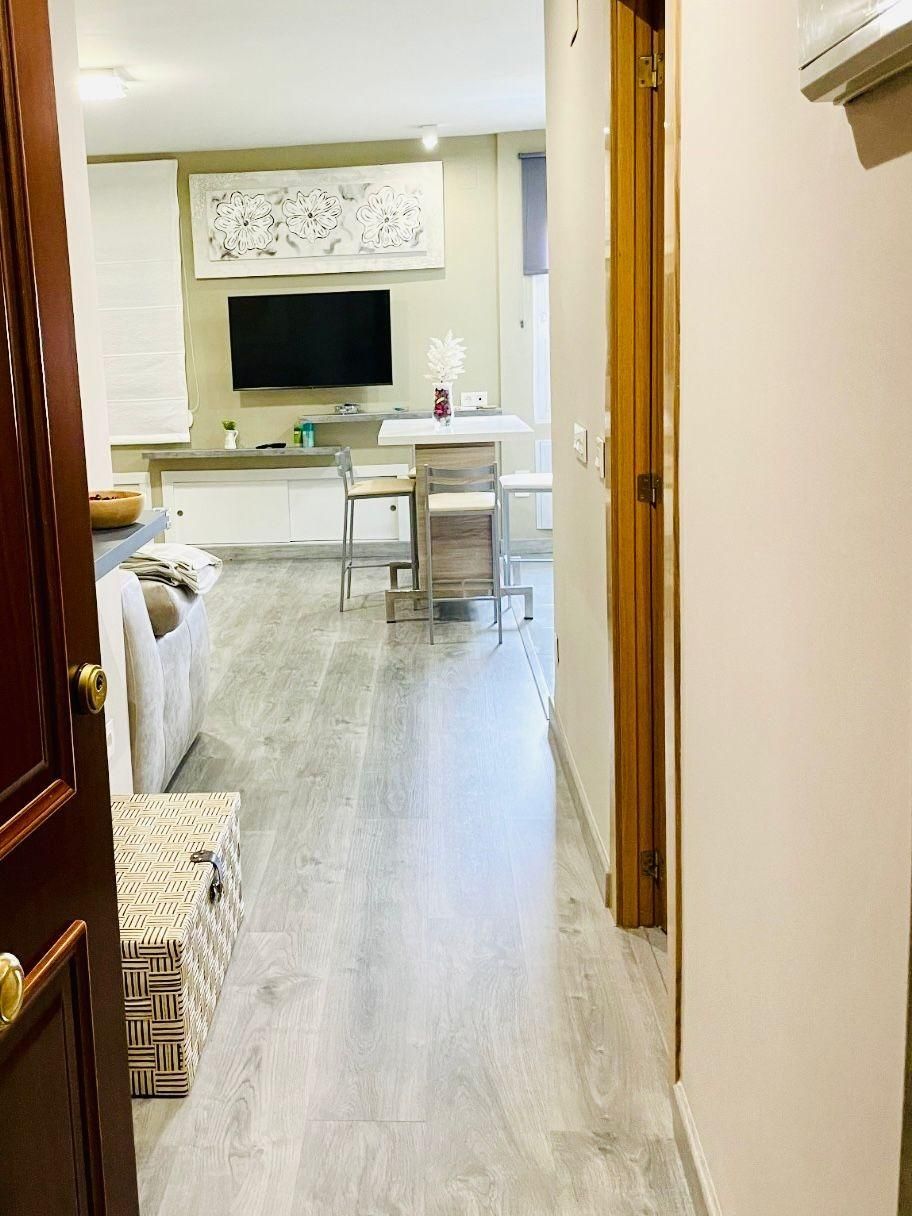 Living room of Flat for sale in Fuengirola  with Air Conditioner, Private garden and Furnished