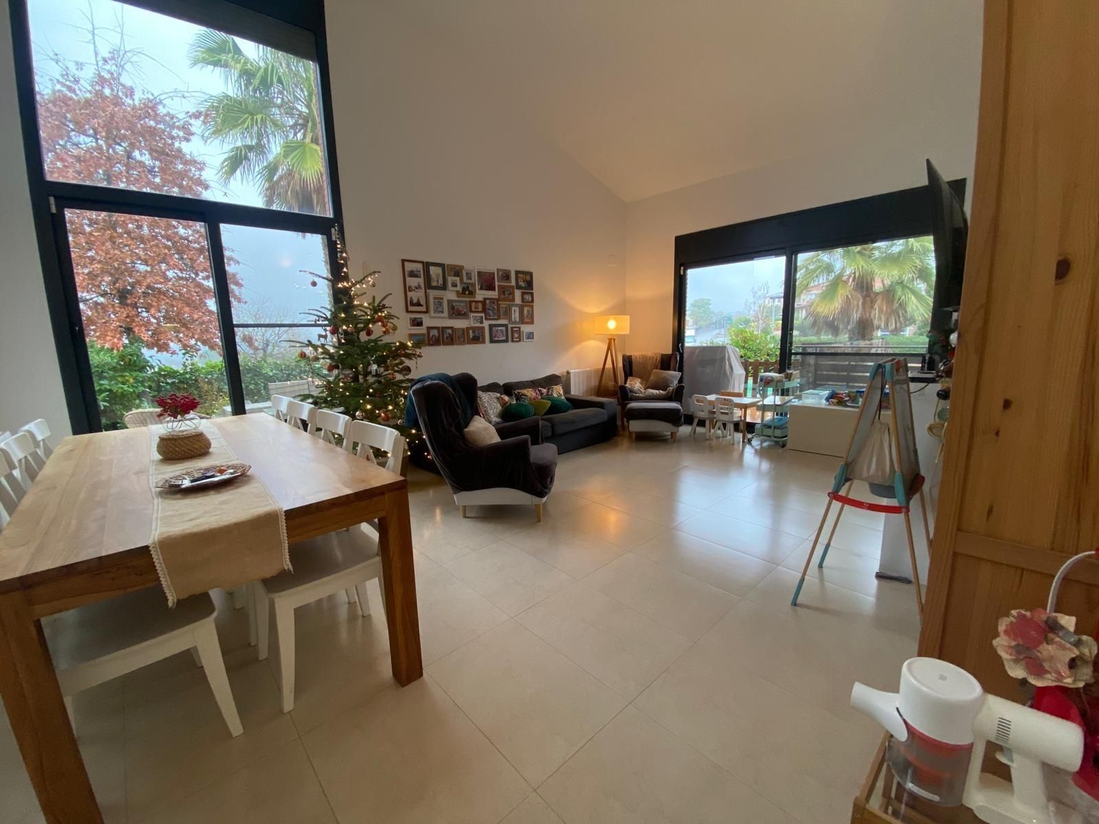 Living room of Single-family semi-detached for sale in La Roca del Vallès  with Private garden and Swimming Pool