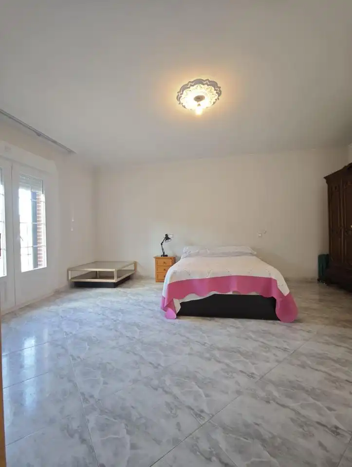 Habitación de Casa adosada en venta en El Álamo con Aire acondicionado, Calefacción y Jardín privado