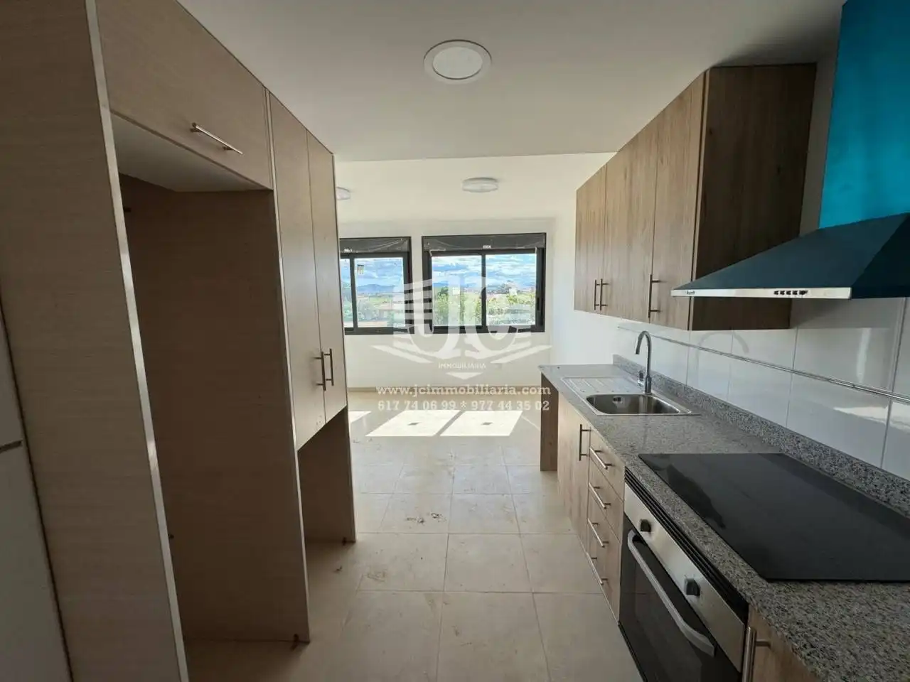 Kitchen of Flat for rent in L'Aldea  with Air Conditioner, Terrace and Storage room
