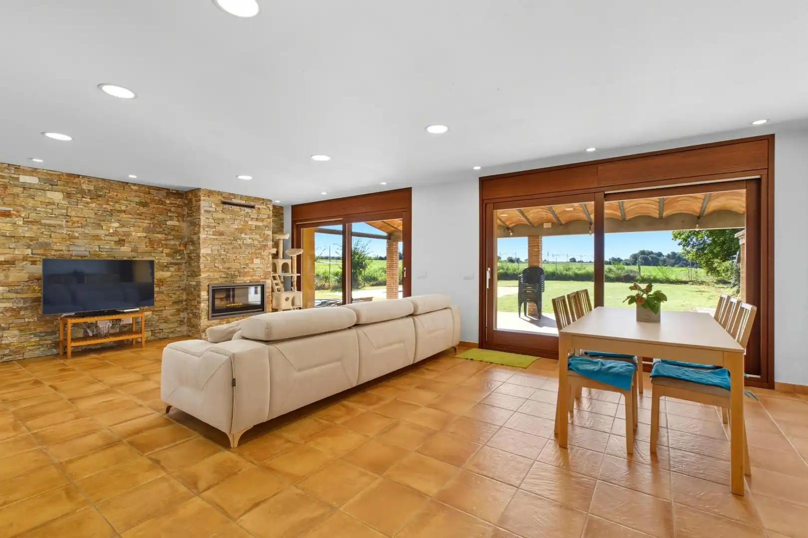 Living room of Country homes for sale in Garrigàs  with Private garden, Terrace and Swimming Pool