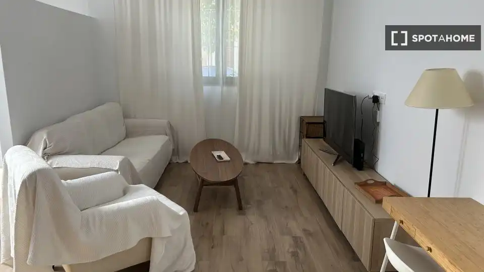 Sala de estar de Apartamento para compartir en Sevilla con Aire acondicionado, Terraza y Amueblado