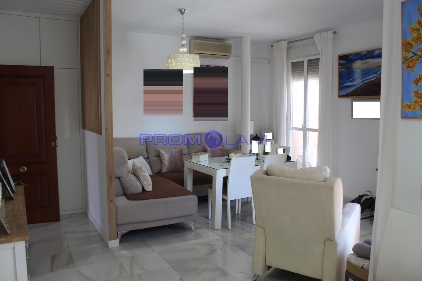 Sala d'estar de Pis en venda en Coria del Río amb Aire condicionat, Terrassa i Moblat
