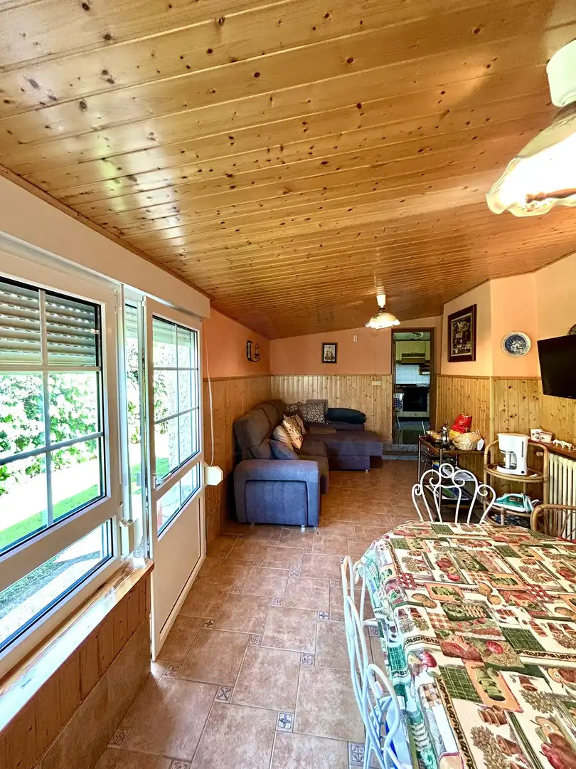 Sala de estar de Casa o chalet en venta en Villadangos del Páramo con Calefacción, Terraza y Piscina