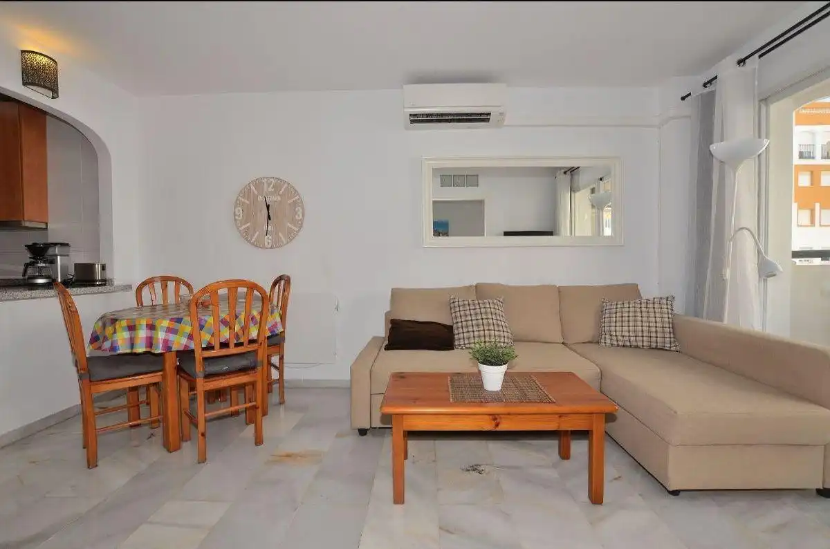 Sala d'estar de Apartament en venda en Benalmádena amb Aire condicionat, Terrassa i Piscina comunitària