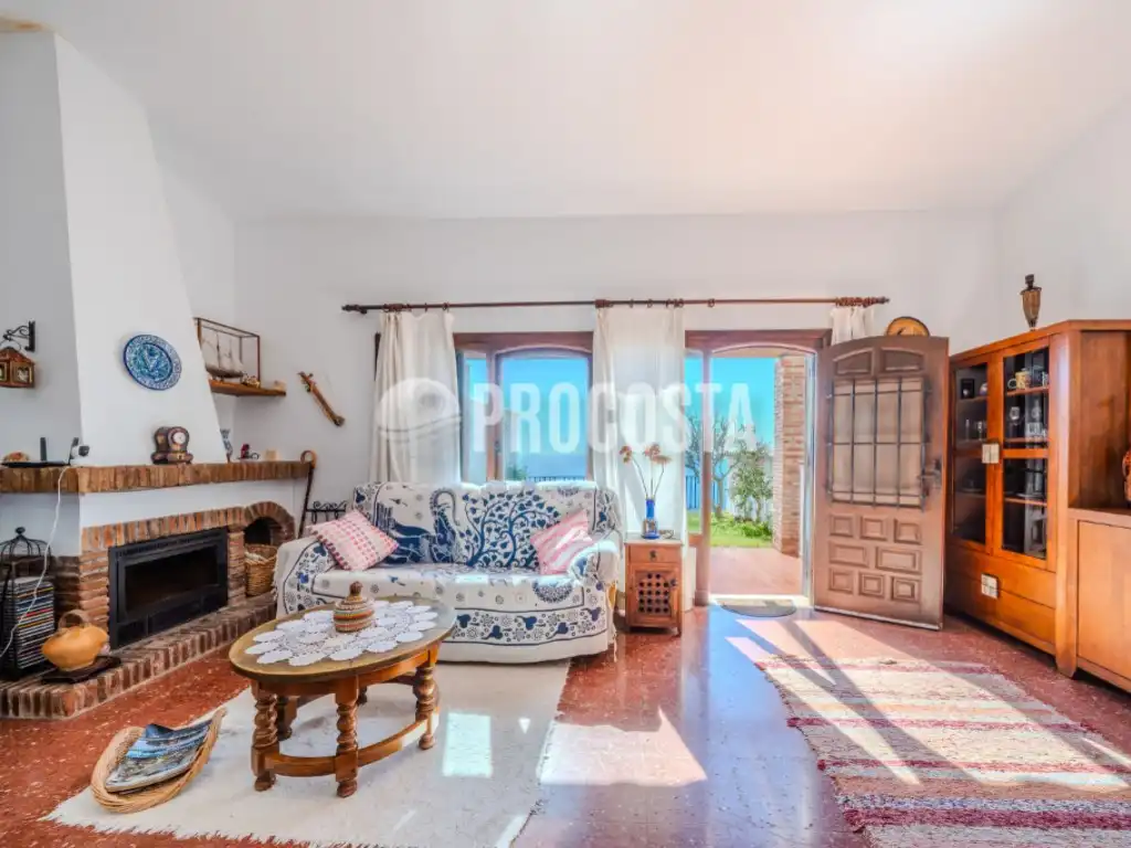 Sala de estar de Casa o chalet en venta en Almuñécar con Aire acondicionado, Jardín privado y Terraza