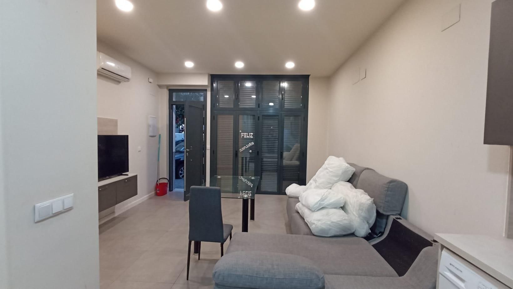 Sala d'estar de Loft de lloguer en  Córdoba Capital amb Aire condicionat i Moblat