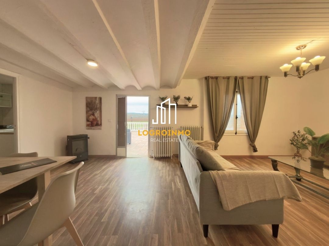 Sala d'estar de Casa o xalet en venda en Huércanos amb Calefacció, Terrassa i Moblat