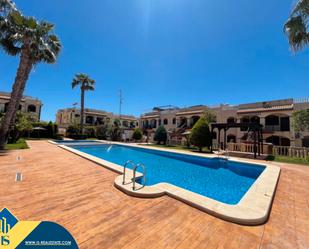 Swimming pool of House or chalet for sale in Torrevieja  with Air Conditioner, Heating and Terrace