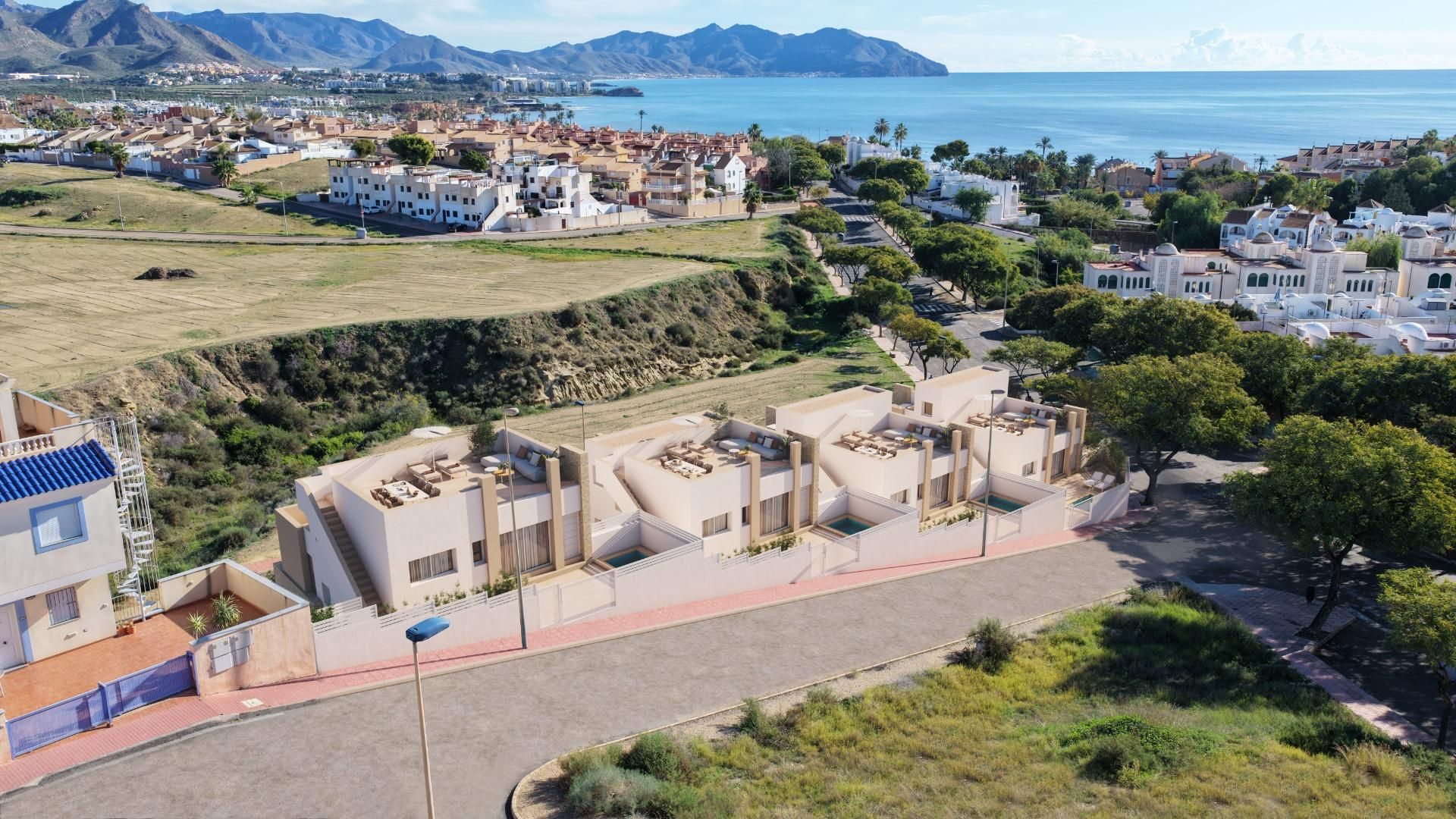 Vista exterior de Casa adosada en venda en Mazarrón amb Terrassa, Piscina i Piscina comunitària