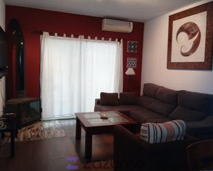 Sala d'estar de Casa adosada de lloguer en Olivares amb Aire condicionat, Calefacció i Jardí privat