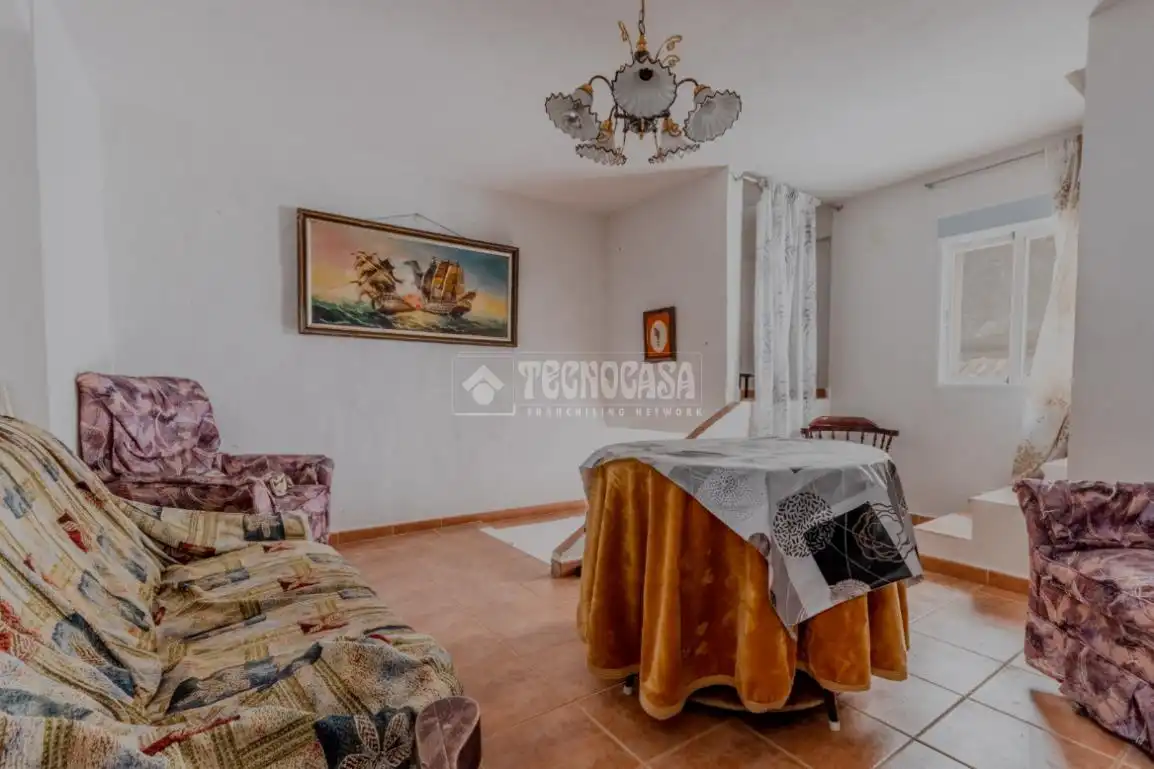 Sala d'estar de Casa adosada en venda en Güéjar Sierra amb Balcó