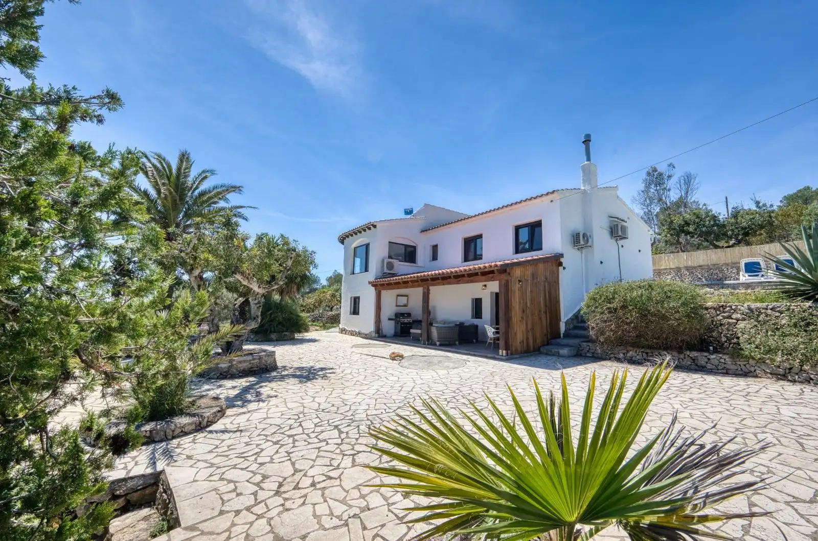 Vista exterior de Casa o xalet en venda en Benissa amb Aire condicionat, Jardí privat i Piscina
