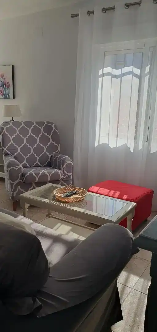 Sala d'estar de Casa adosada de lloguer en Mazagón amb Jardí privat, Moblat i Forn
