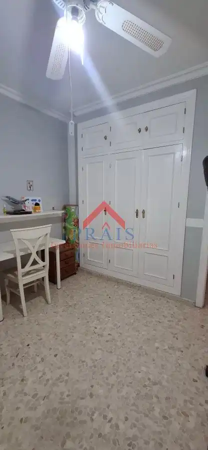 Habitación de Casa adosada en venta en Utrera con Aire acondicionado y Trastero