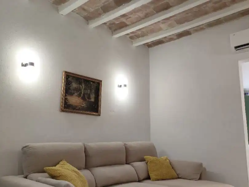 Sala d'estar de Casa adosada en venda en Vilanova i la Geltrú amb Aire condicionat, Terrassa i Balcó