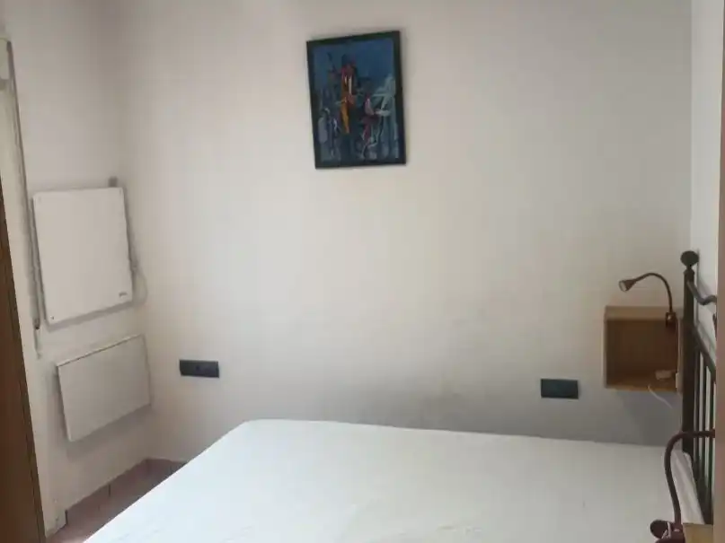 Dormitori de Casa adosada de lloguer en Vélez-Málaga amb Balcó