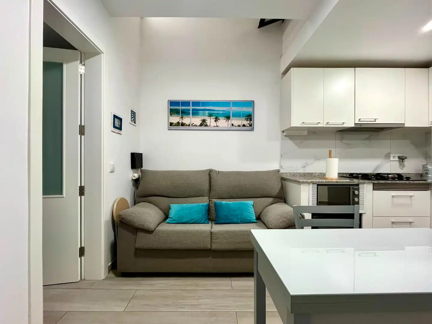Sala d'estar de Estudi de lloguer en Agüimes amb Moblat i TV