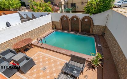 Swimming pool of Single-family semi-detached for sale in Vegas del Genil  with Air Conditioner, Heating and Terrace