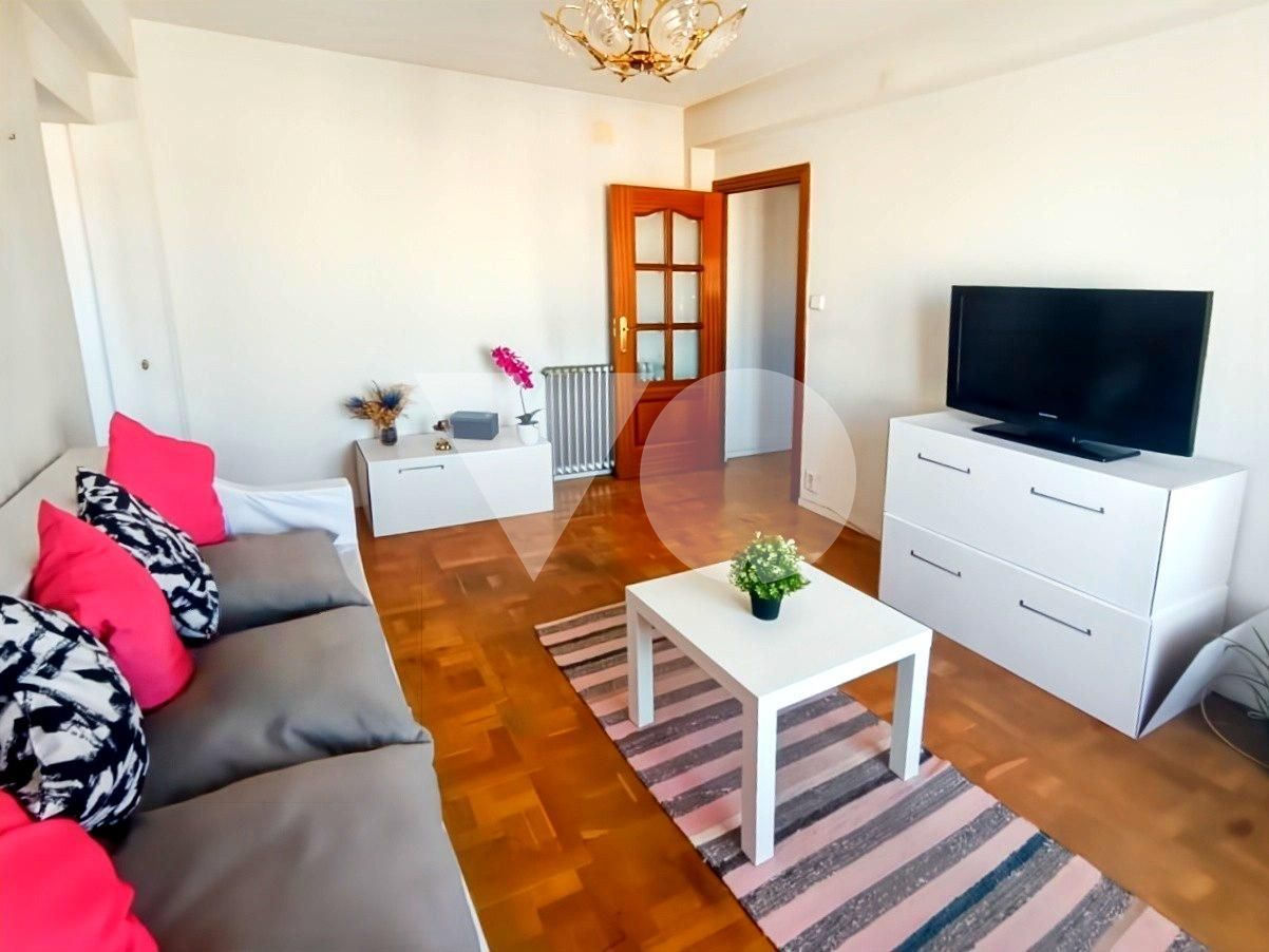 Living room of Flat for sale in  Madrid Capital  with Heating, Parquet flooring and Terrace
