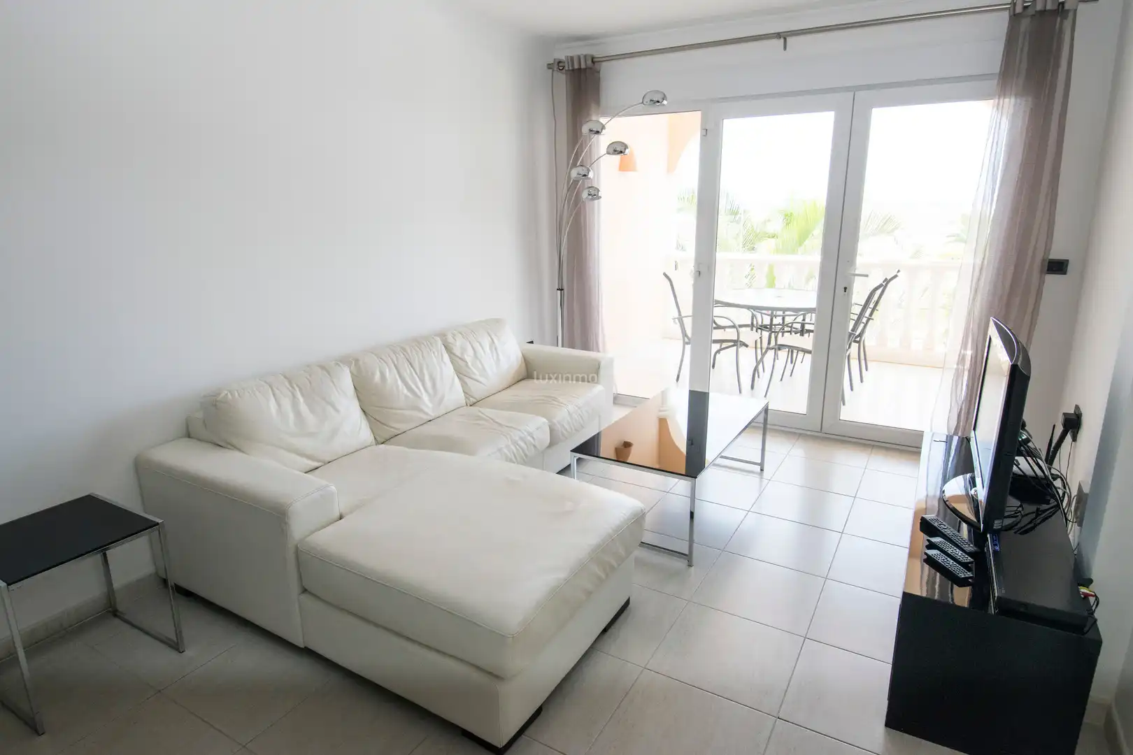 Sala d'estar de Pis en venda en Benissa amb Aire condicionat, Jardí privat i Terrassa