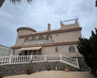 Vista exterior de Casa o xalet en venda en La Manga del Mar Menor amb Jardí privat, Terrassa i Traster