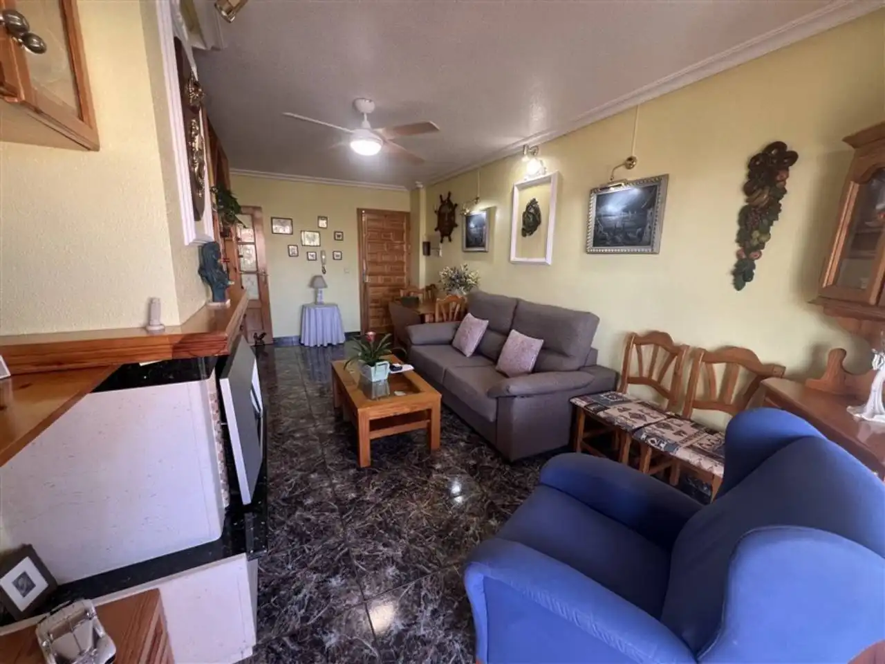 Sala de estar de Apartamento en venta en La Manga del Mar Menor con Aire acondicionado, Terraza y Piscina comunitaria