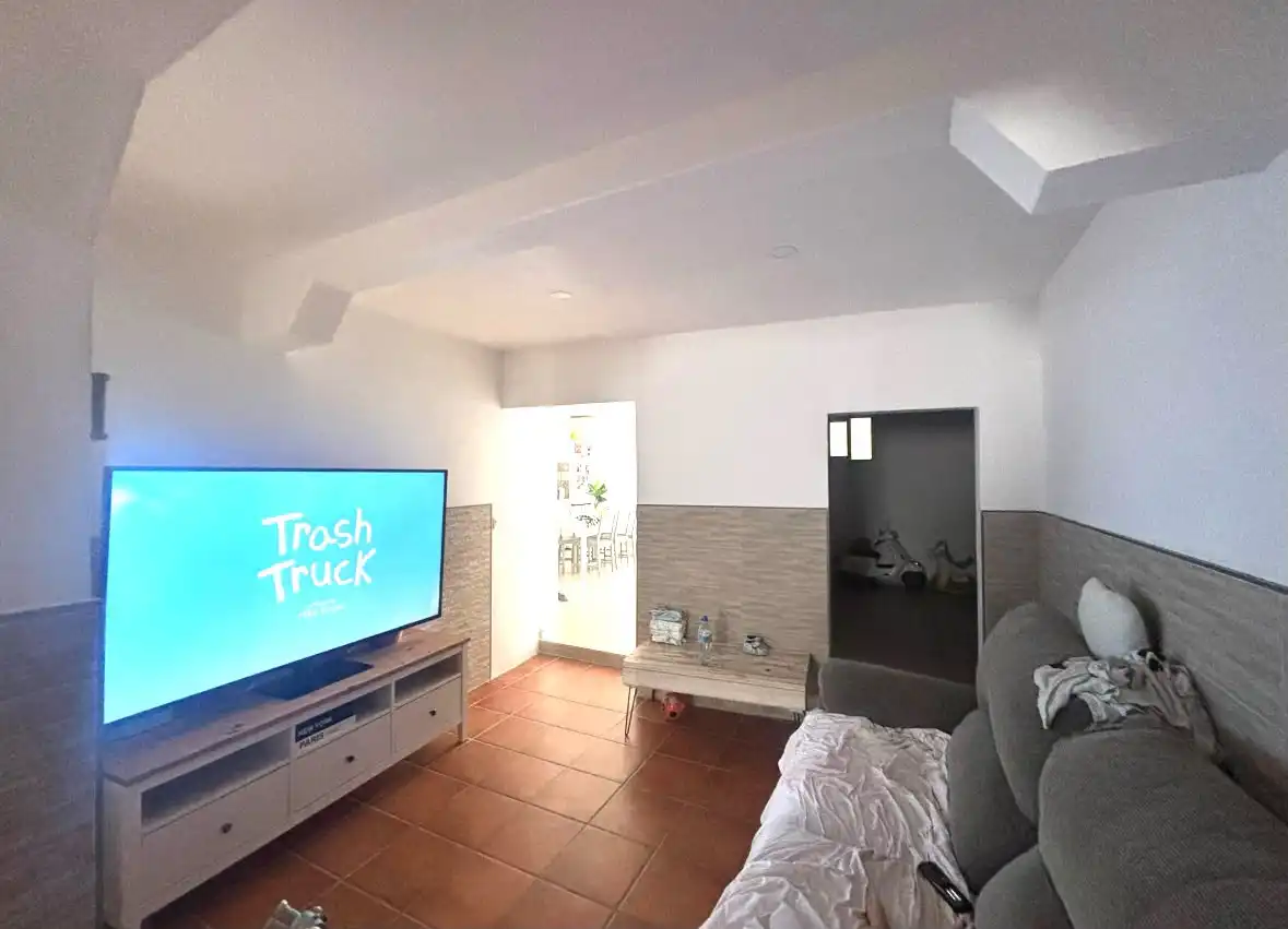 Sala de estar de Casa adosada en venta en Benagalbón