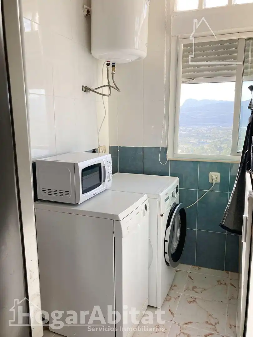 Küche von Wohnung zum Verkauf in Gandia mit Klimaanlage, Privatgarten und Gemeinschaftspool