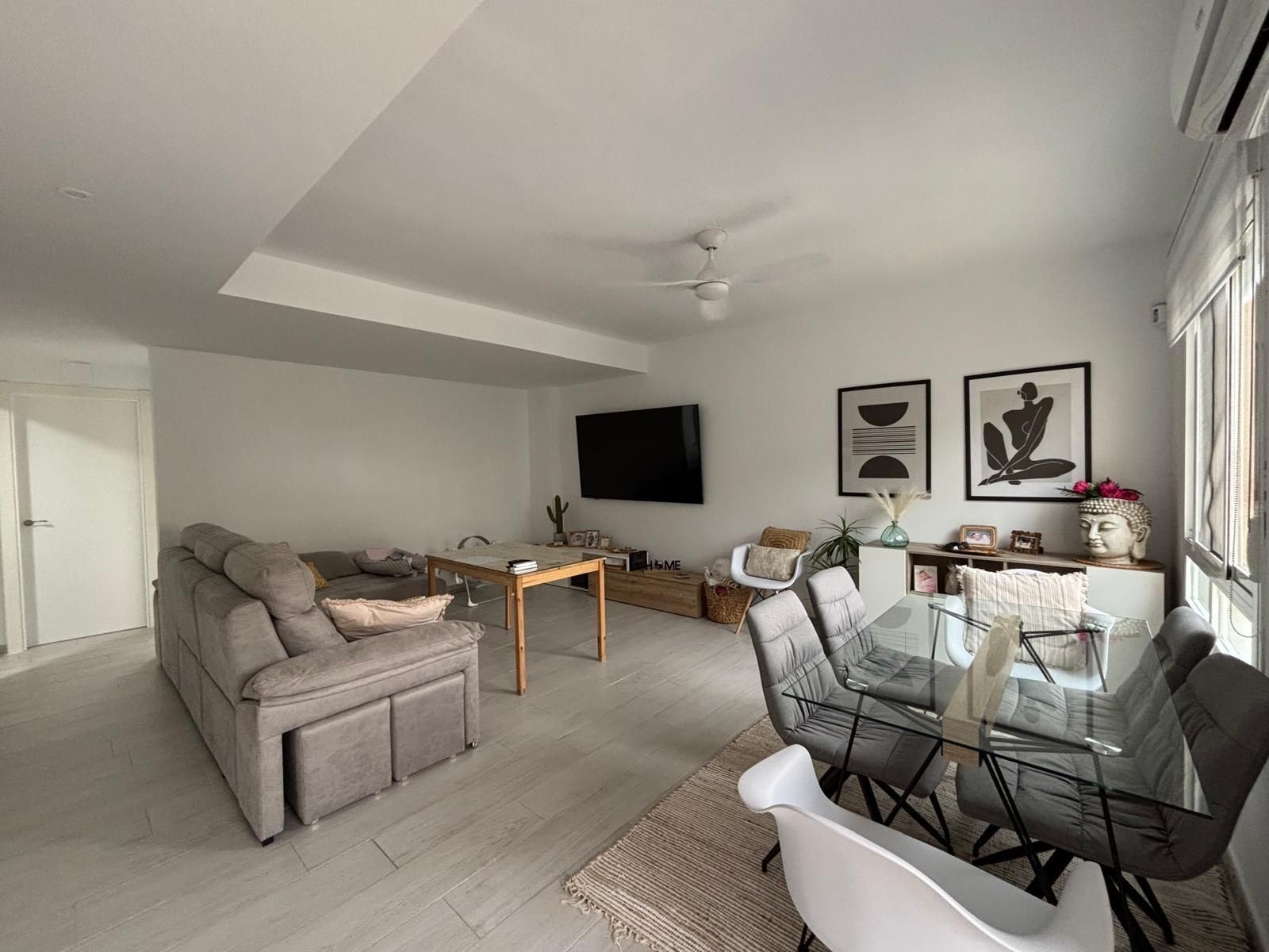 Sala de estar de Casa adosada en venta en Cáceres Capital con Aire acondicionado, Calefacción y Terraza
