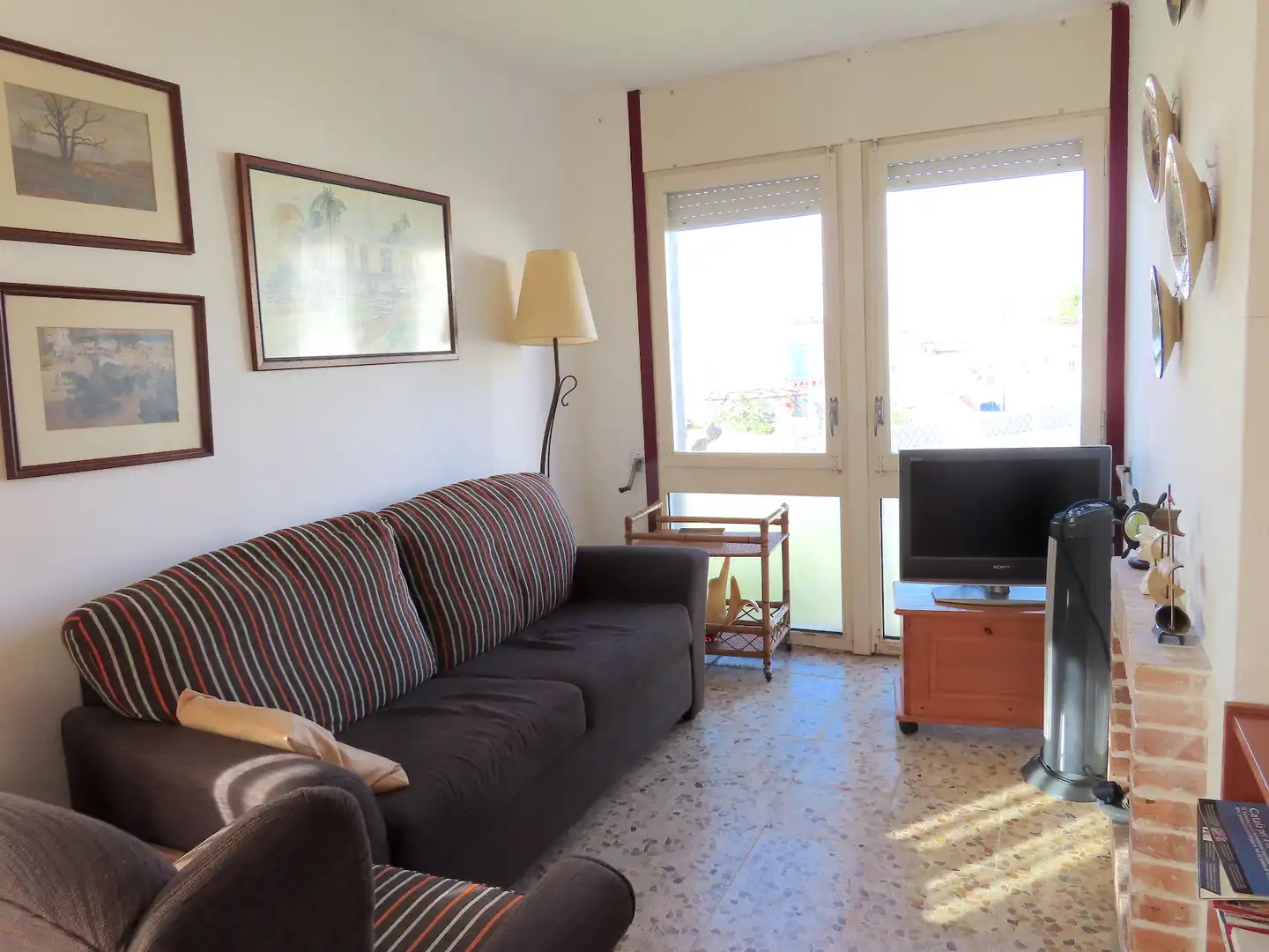Sala de estar de Piso en venta en Empuriabrava con Jardín privado, Terraza y Amueblado