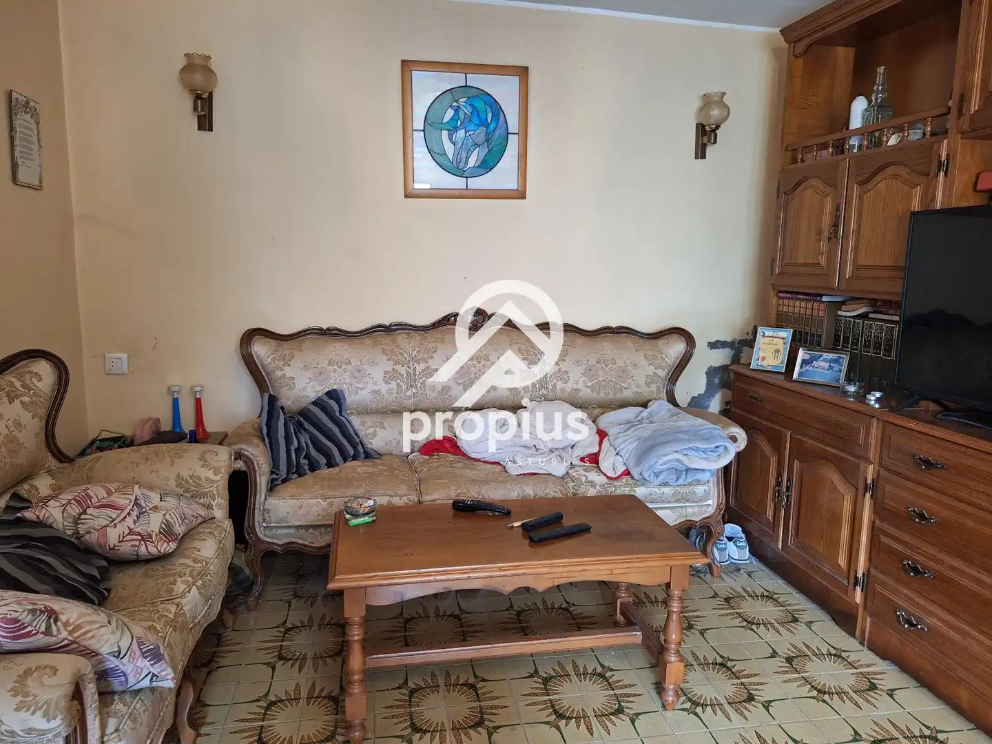 Sala d'estar de Casa adosada en venda en Llanes amb Calefacció
