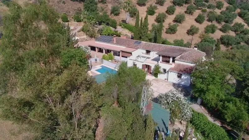 Casa rústica con piscina en venta en Barriada los Llanos
